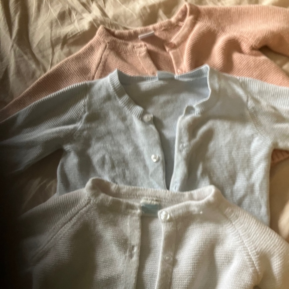 Three cardigans